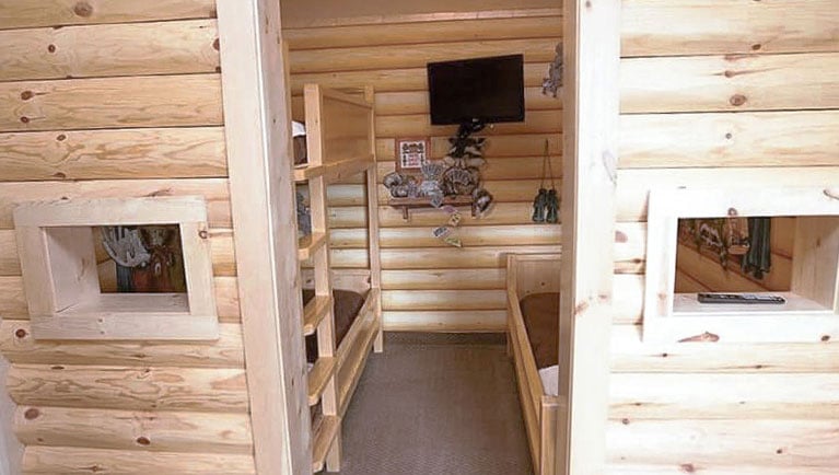 The bunk beds inisde the cabin in the accessible shower Junior Cabin Suite